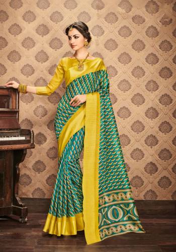 For A Rich Elegant Look, Grab This Silk Saree In Blue Color Paired With Contrasting Yellow Colored Blouse. This Saree And Blouse Are Fabricated On Kota Art Silk Beautified with Prints All Over It. 