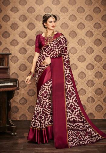 For Your Semi-Casual Wear, Grab This Rich Saree In Dark Magenta Color Paired With Dark Magenta Colored Blouse. This Saree And Blouse Are Fabricated On Kota Art Silk Beautified With Prints All Over It. This Saree Is Durable And Also Easy To Drape.