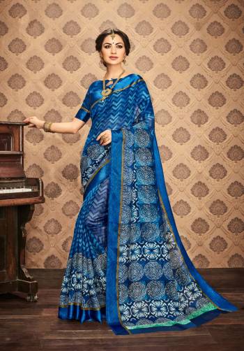 Grab This Simple Saree For your Semi-Casual Wear In Blue Color Paired With Blue Colored Blouse. This Saree And Blouse Are Fabricated On Kota Art Silk Beautified With Mixed Prints All Over It. Buy This Saree Now.