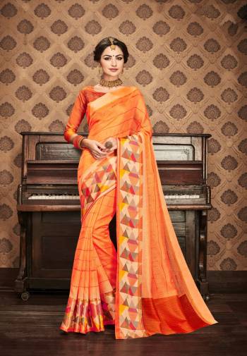 Orange Color Induces Perfect Summery Appeal To Any Outfit So Grab This Attractive Saree In Orange Color Paired With Orange Colored Blouse. This Saree And Blouse Are Fabricated On Kota Art Silk. It Is Easy To Drape And Carry All Long. Buy This Saree Soon.