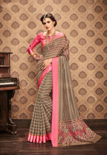 Here Is A Very Pretty Saree In Light Brown Shade Paired With Contrasting Pink Colored Blouse. This Saree And Blouse Are Fabricated On Kota art Silk Beautified With Intricate Prints. Buy This Saree Now.