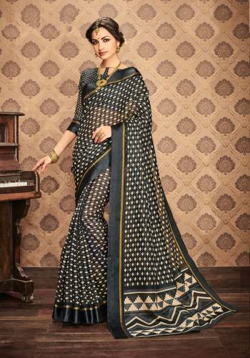 Rich And Elegant Looking Saree Is Here In Dark Grey Color Paired With Dark Grey Colored Blouse. This Saree and Blouse Are Fabricated On Kota Art Silk. It Is Light In Weight And Also Easy To Carry All Day Long. Buy This Saree Now.