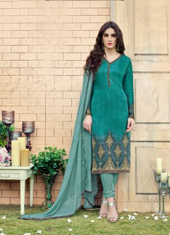 Go With The New Shade Of Blue With This Straight Cut Suit In Teal Blue Color Paired With Teal Blue Colored Bottom And Dupatta.  Its Top Is Fabricated On Satin silk Paired With Crepe Bottom And Chiffon Dupatta. 