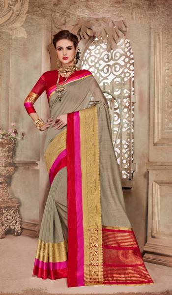 Flaunt Your Rich And Elegant Taste Wearing This Saree In Grey Color Paired With Contrasting Red Colored Blouse. This Saree Is Fabricated On Cotton Silk Paired With Art Silk Fabricated Blouse. Its Is Beautified With Weave Over The Lace Border.