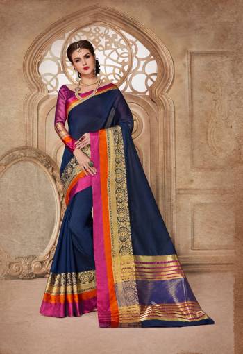 Enhance Your Personality Wearing This Saree In Navy Blue Color Paired With Contrasting Light Purple Colored Blouse. This Saree Is Fabricated On Cotton Silk Paired With Art Silk Fabricated On Blouse. This Saree Will Give A Rich Look To Your Personality.