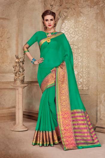 Grab This Saree For Your Semi-Casual Wear In Sea Green Color Paired With Sea Green Colored Blouse. This Saree Is Fabricated On Cotton Silk Paired With Art Silk Fabricated Blouse. It Has Weave Over The Border. Buy Now.