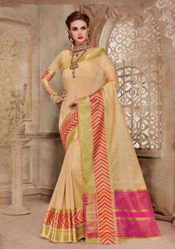 Flaunt Your Rich And Elegant Taste Wearing This Saree In Cream Color Paired With Cream Colored Blouse. This Saree Is Fabricated On Cotton Silk Paired With Art Silk Fabricated Blouse. Its Is Beautified With Weave Over The Lace Border. It Is Soft Towards Skin And Easy To Carry All Day Long. Buy This Saree Now.