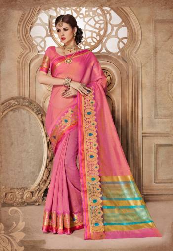 Look Pretty Wearing This Pink Colored Saree Paired With Pink Colored Blouse. This Saree Is Fabricated On Cotton Silk Paired With Art Silk Fabricated Blouse. Its Bright Colors And Weave Over The Border Is Making The Saree Attractive.