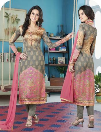 Get Ready For The Next Fucntion At Your Place With this Pretty Staright Cut Suit In Grey Color Paired With Grey colored Bottom And dupatta. Its Top Is Fabricated On Satin Paired With Crepe Bottom And chiffon Dupatta. Get This Dress Material Stitched As Per Your Desired Fit And Comfort.