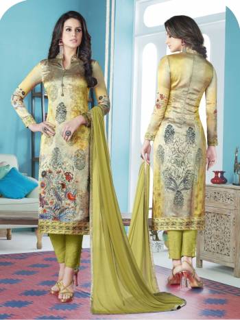 Look Pretty In This Dress Material In Light Green Colored Top Paired With Pear Green Colored Bottom And Dupatta. Its Top Is Fabricated On Satin Paired With Crepe Bottom And Chiffon Dupatta. It Is Beautified With Prints All Over. Buy Now.