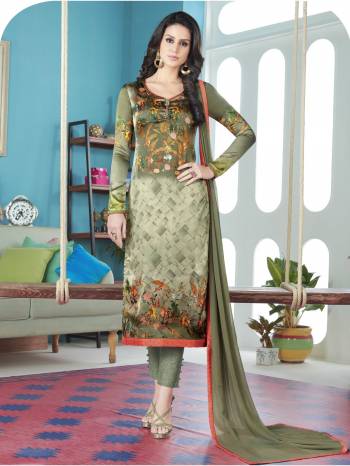 New Shade In Green Is Here With This Dress Material In Olive Green Color Paired With Olive Green Colored Bottom And Dupatta. Its TopIs Fabricated On Satin Paired With Crepe Bottom And Chiffon Dupatta. All three fabrics Ensures Superb Comfort All Day Long. Buy This Dress Material Now.