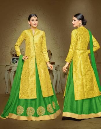 More Colorful Your Wear, More Attractive You Look. So Grab This Semi-Stitched Indo-Western Suit In Yellow Color Paired With Contrasting Green Colored Lehenga And Dupatta. Its Top Is Fabricated On Jacquard Silk Paired With Art Silk Lehenga And Chiffon Dupatta. It Has Embroidery Over The Lehenga. Buy Now.