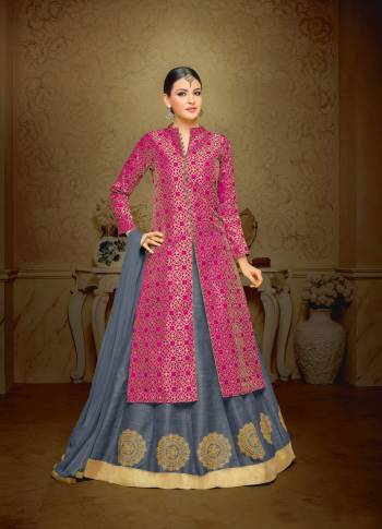 For A Little Subtle Look Grab This Indo-Western Suit In Rani Pink Colored Top Paired With Contrasting Grey Colored Lehenga And Dupatta. Its Top Is Fabricated On Jacquard Silk Paired With Art Silk Lehenga And Chiffon Dupatta. This Beautiful Color Combination Will Earn You Lots Of Compliments From Onlookers.