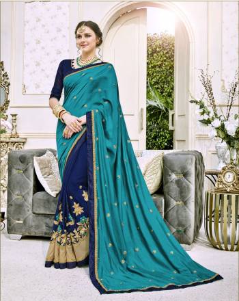 Shades Of Blue Always Looks Pretty Cool, So Grab This Saree In Blue And Royal Blue Color Paired With Royal Blue Colored Blouse. This Saree Is Fabricated On Art Silk And Silk Georgette Paired With Art silk Fabricated Blouse. Its Fabrics Ensures Superb Comfort All Day Long. Buy Now.