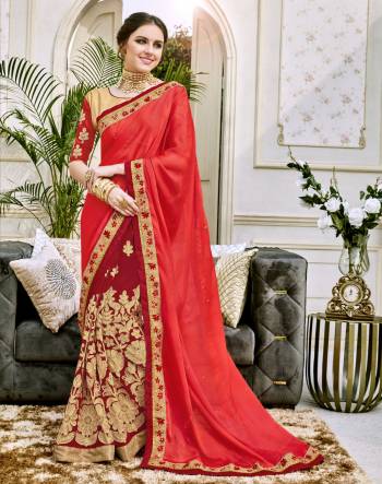 Adorn The Angelic Look Wearing This Saree In Red Color Paired With Beige Colored Blouse. This Saree IS fabricated On Georgette Paired With Art Silk Fabricated Blouse. It Is Light In Weight And Easy To Carry All Day Long.