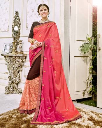 Bright And Visually Appealing Colors Are In This Pretty Saree. Grab This Saree In Orange And Brown Color Paired With Brown Colored Blouse. This Saree Is Fabricated On Art Silk And Georgette Paired With Art Silk Fabricated Blouse. It Is Durable And Easy To Care For.