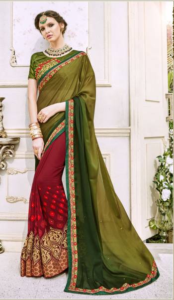 Wear The whole Traditonal Look With This Saree In Traditonal Indian Combination In Pear Green And Red Colored Saree Paired With Green Colored Blouse. This Saree Is Fabricated On Silk Georgette And Chiffon Paired With Art Silk Fabricated Blouse. Its Attractive Colors And Embroidery Will Earn You Lots Of Compliments From Onlookers.