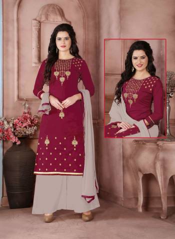 Rich And Elegant Combination Is Here With This Straight Cut Suit In Magenta Pink Color Paired With Grey Colored Bottom Aand Dupatta. Its Top Is Fabricated On Cambric Cotton Paired With Cotton Bottom And Chiffon Dupatta. Get This Dress Material Stitched As Per Your Desired Fit And Comfort. Buy Now.