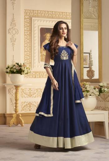 Here Is A Beautiful Designer Floor Length Suit In Navy Blue Color paired With Navy Blue Colored Bottom And Dupatta. Its Top Is Fabriacted On Art Silk Paired With Santoon Bottom And Chiffon Dupatta. Buy This Readymade Suit Now And Flaunt Your Designer Elegant Taste.