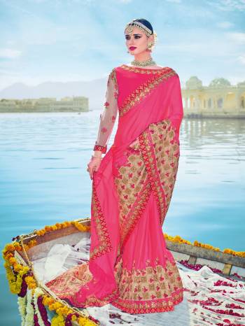 Gorgeously mesmerizing is what you will look at the next wedding gala wearing this beautiful pink color two tone bright georgette saree. Ideal for party, festive & social gatherings. this gorgeous saree featuring a beautiful mix of designs. Its attractive color and designer embroidered design, patch design, beautiful floral design work over the attire & contrast hemline adds to the look. Comes along with a contrast unstitched blouse.