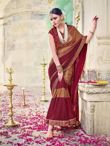 The fabulous pattern makes this saree from Indian Women a classy number to be included in your wardrobe. maroon and copper color lycra with coating saree. Ideal for party, festive & social gatherings. this gorgeous saree featuring a beautiful mix of designs. Its attractive color and beautiful design, cut paste work design work over the attire & contrast hemline adds to the look. Comes along with a contrast unstitched blouse.