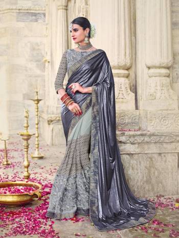 Wear this grey color two tone lycra with coating and net lycra jacquard saree. Ideal for party, festive & social gatherings. this gorgeous saree featuring a beautiful mix of designs. Its attractive color and designer embroidered design, patch design, stone, beautiful floral design work over the attire & contrast hemline adds to the look. Comes along with a contrast unstitched blouse.