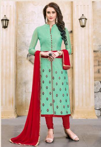 Add This Pretty Straight Cut Suit To Your Wardrobe In Sea Green Color Paired With Contrasting Red Colored Botttom And Dupatta. Its Top Is Fabricated On Modal Cotton Paired With Cotton Bottom And Chiffon Dupatta. Get This Stitched As Per Your Desired Fit And Comfort.