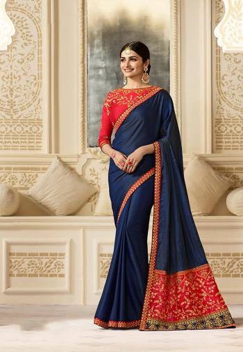 Look Beautiful Wearing This Saree In Navy Blue Color Paired With Contrasting Red Colored Blouse. This Saree Is Fabricated On Silk Paired With Art Silk Fabricated Blouse. It Is Light In Weight And Also Easy To Drape and Carry All Day Long. Buy Now.