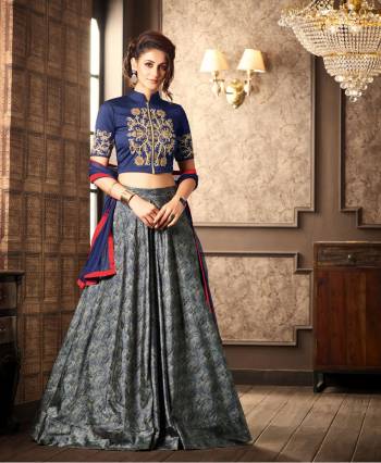 For A Pretty Indian Beuty Grab This Beautiful Dress In Blue Colored Blouse Paired With Grey colored Lehenga And Blue Dupatta. Its Has Beautiful Front Embroidery Which Making The Dress More Attractive.