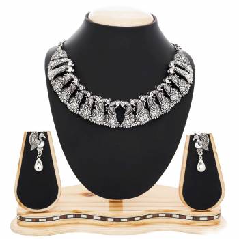 Here Is An Elegant Choker Patterned Necklace In Silver Color Which Gives An Elegant Look To Your Neckline. Buy This Necklace Set Now.