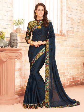 Enhance Your Beauty Wearing This Navy Blue Colored Saree Paired With Multi Colored Blouse. This Saree Is Fabricated On Silk Georgette Paired With Georgette Fabricated Blouse. It Has Lovely Prints Over The Saree and Blouse. Buy This Saree Now.