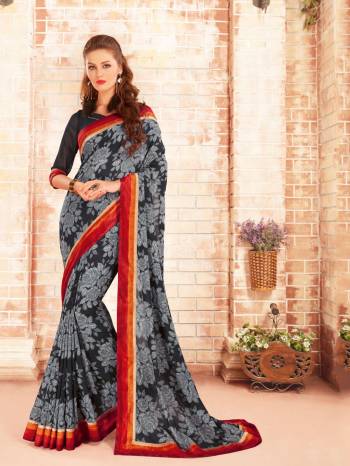 Enhance Your Beauty Wearing This Saree In Black Color Paired With black Colored Blouse. This Saree Is Fabricated On Silk Georgette Paired With Georgette Fabricated Blouse. It Has Beautiful Bold Prints All Over The Saree. Buy Now. 