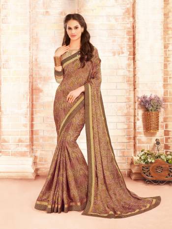 For Your Semi-Casual Wear Grab This Lovely Saree In Brown Color Paired With Beige Colored Blouse. This Saree Is Fabricated On Silk Georgette Paired With Georgette Fabricated Blouse. It Is Durable Easy To Drape And Carry All Day Long. 