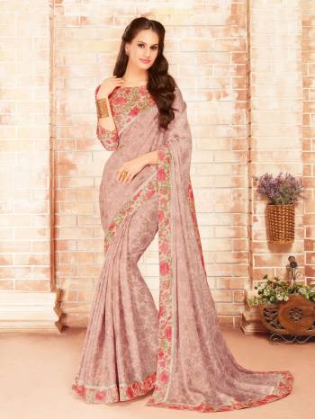 Flaunt Your Rich And Elegant Taste Wearing This Saree In Dusty Pink Color Paired With Multi Colored Blouse. This Saree Is Fabricated On Silk Georgette Paired With Georgette Fabricated Blouse. It Has Pretty Floral Prints Which Will Earn You Lots Of Compliments From Onlookers.