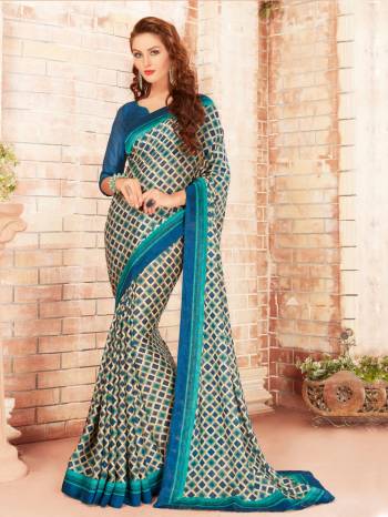 Grab This Casual Saree In White And Blue Color Paired With Blue Colored Blouse. This Saree Is Fabricated On Silk Georgette Paired With Georgette Fabricated Blouse. It Has Checks Prints All Over the Saree. Buy Now.