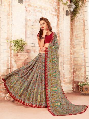 Go Floral With This Elegant Saree In Grey Color Paired With Contrasting Maroon Colored Blouse. This Saree Is Fabricated On Silk Georgette Paired with Georgette Fabricated Blouse. It Has Pretty Intricate Prints All Over It. Buy Now.