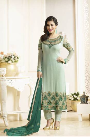 Go With This Shades Of Blue With This Pretty Straight Cut Suit In Baby Blue Color Paired With Baby Blue Colored Bottom And Contrasting Sea Green Colored Dupatta. Its Pretty Colors That Compliments Each Other Will Earn You Lots Of Compliments From Onlookers. Buy Now.