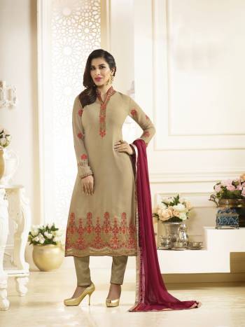 Simple and Elegant Looking Suit Is Here For Your Next Family Function. Grab This Beige Colored Straight Cut Suit Paired With Contrasting Magenta Pink Colored Dupatta. Its Top Is Fabricated On Georgette Paired With Santoon Bottom And Chiffon Dupatta. It Has Pretty Embroidery With Contrasting Thread & Jari.