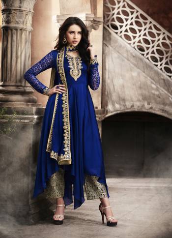 Shine Bright With This Designer Suit In Royal Blue Color Paired With Royal Blue Colored Bottom And Dupatta. Its Top Is Fabricated On Georgette Paired With Jacquard Silk Bottom And Chiffon Dupatta. This Suit Is Light Weight And Easy To Carry All Day Long.