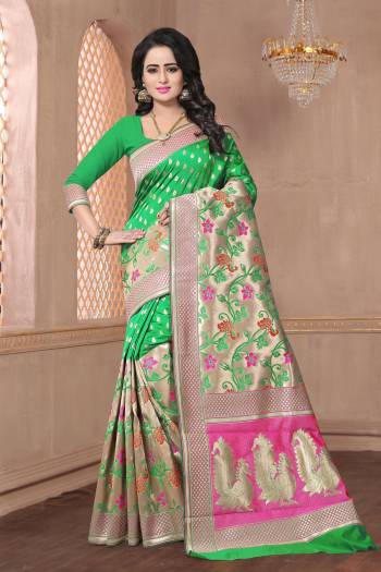 Look Pretty Wearing This Saree In Green Color Paired With Green Colored Blouse. This Saree And Blouse Are Fabricated On Banarasi Art Silk Beautified With Weave. It Has Pretty Contrasting Colors Which Is Making The Saree Attractive. Buy Now.