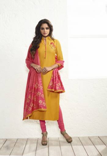 Shine Bright Wearing This Designer Straight Cut Suit In Yellow Color Paired With Contrasting Pink Colored Bottom And Dupatta. Its Top And Dupatta Are Fabricated On Maslin Silk Paired With Santoon Bottom. This Readymade Suit Is Available In Many Sizes. Buy Now.