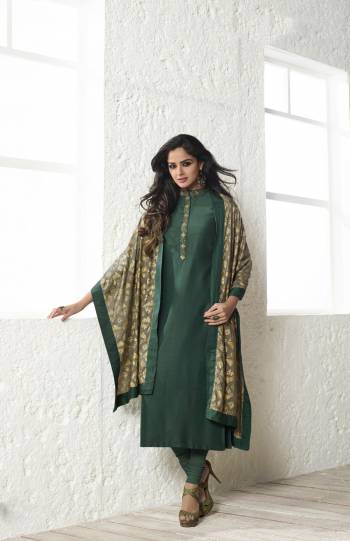 New Shade Of Green Is Here With This Straight Cut Designer Suit In Pine Green Color Paired With Pine Green Bottom And Grey And Cream Colored Dupatta. Its Top And Dupatta Are Fabricated On Maslin Silk Paired With Santoon Bottom. It Is Light Weight And Easy To Carry All Day Long.