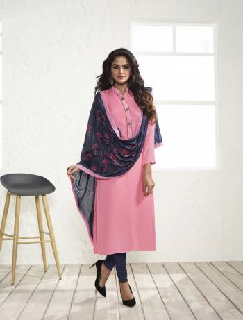 Look Pretty Wearing This Straight Cut Suit In Pink Color Paired With Dark Grey Colored Bottom And Dupatta. Its Top And Dupatta Are Fabricated On Maslin Silk Paired With Santoon Bottom. This Lovely Unique Combination Will Earn You Lots Of Compliments From Onlookers. 