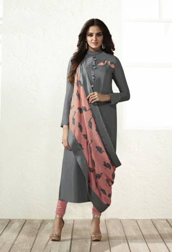 Flaunt Your Rich And Elegant Taste Wearing This Staright Cut Suit In Grey Color Paired With Dusty Pink Colored Bottom And Dupatta. Its Top And Dupatta are Fabricated On Maslin Silk Paired With Santoon Bottom. Buy This Lovely Designer Suit Now.