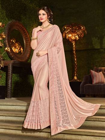 Look your ethnic best by wearing this dusty pink color imported coated fabrics and important net jacquard fabrics and jacquard border and diamond border saree. Ideal for party, festive & social gatherings. this gorgeous saree featuring a beautiful mix of designs. Its attractive color and designer heavy embroidered design, beautiful floral design, cut paste design work over the attire & contrast hemline adds to the look. Comes along with a contrast unstitched blouse.