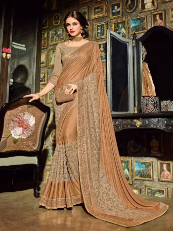 You Look elegant and stylish this festive season by draping this brown color imported coated fabrics and net jacquard fabrics and jacquard border and diamond border saree. Ideal for party, festive & social gatherings. this gorgeous saree featuring a beautiful mix of designs. Its attractive color and designer heavy embroidered design, beautiful floral design, cut paste design work over the attire & contrast hemline adds to the look. Comes along with a contrast unstitched blouse.