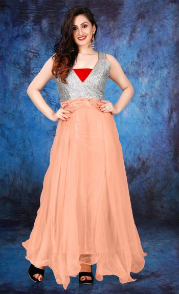 Get Ready For The Next Party With This Gown Suit In Peach And Silver Color Fabricated On Art Silk And Net. It Is Light In Weight And Ensures Superb Comfort All Day Long. Also It Will Earn You Lots Of Compliments From Onlookers.