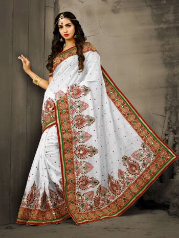 Celebrate This Festive Season Wearing This Saeee In White Color Paired With Rich Maroon Colored Blouse. This Saree Is Fabricated On Soft Art Silk Paired Wuth Art Silk Fabricated Blouse. It Has Beautiful Attractive Embroidery All Over The Saree.