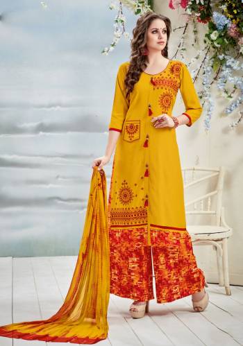 Yellow And Orange Color Induces Perfect Summery Appeal To Any Outfit So Grab This Readymade Suit In Yellow Colored Top And Dupatta Paired With Orange Colored Plazzo. Its Top Is Fabricated On Rayon Cotton Paired With Cotton Bottom And Chiffon Dupatta. It Is Light In Weight And Easy To Carry All Day Long.