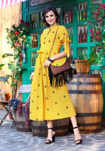 New And Unique Patterned Kurti Is Here In Lovely Yellow Color Fabricated On Khadi Cotton. Its Pretty Small Checks Detailing And Knot Pattern Over the Sleeves Waist Is Giving A Tredny Look To This Kurti. Buy This Readymade Kurti Now.